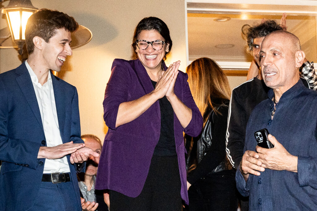Michael Greenberg (left) stands next to Rep. Rashida Tlaib. Credit: Courtesy of Climate Defiance