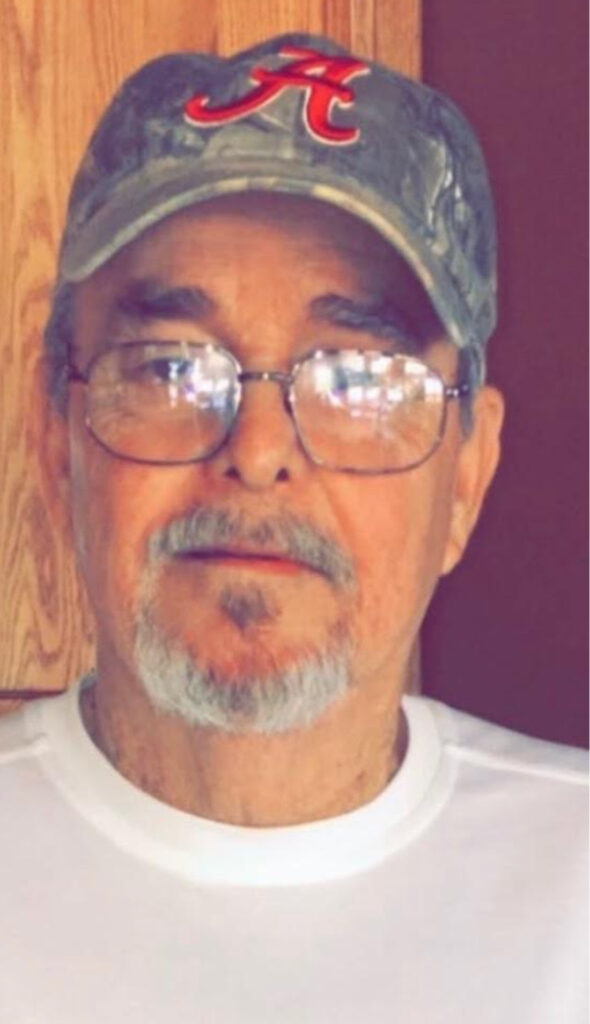 W.M. Griffice was a typical country grandfather, according to his family. He's pictured here wearing a camouflage University of Alabama hat. Credit: Courtesy of the Griffice family